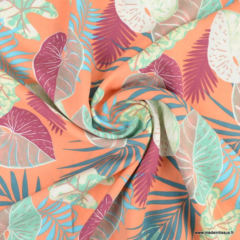 1 coupon de 190 cm Tissu Viscose motifs fleurs plantes exotiques fond saumon