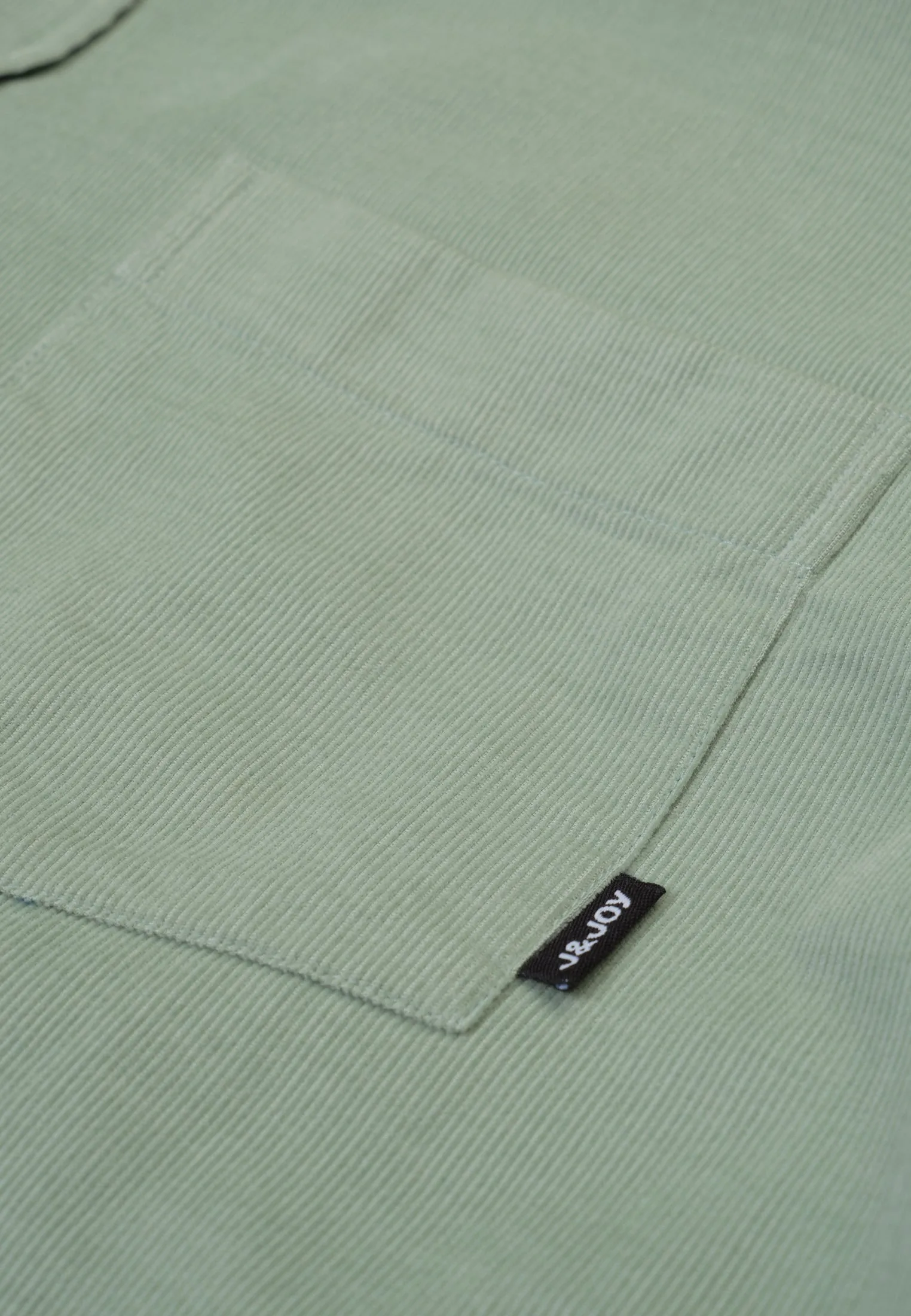 Chemise homme kaki et motif abstrait intérieur
