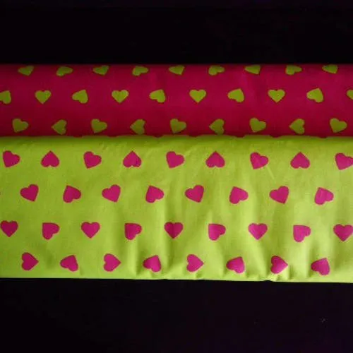 Fuchsia pink hearts on lime green background