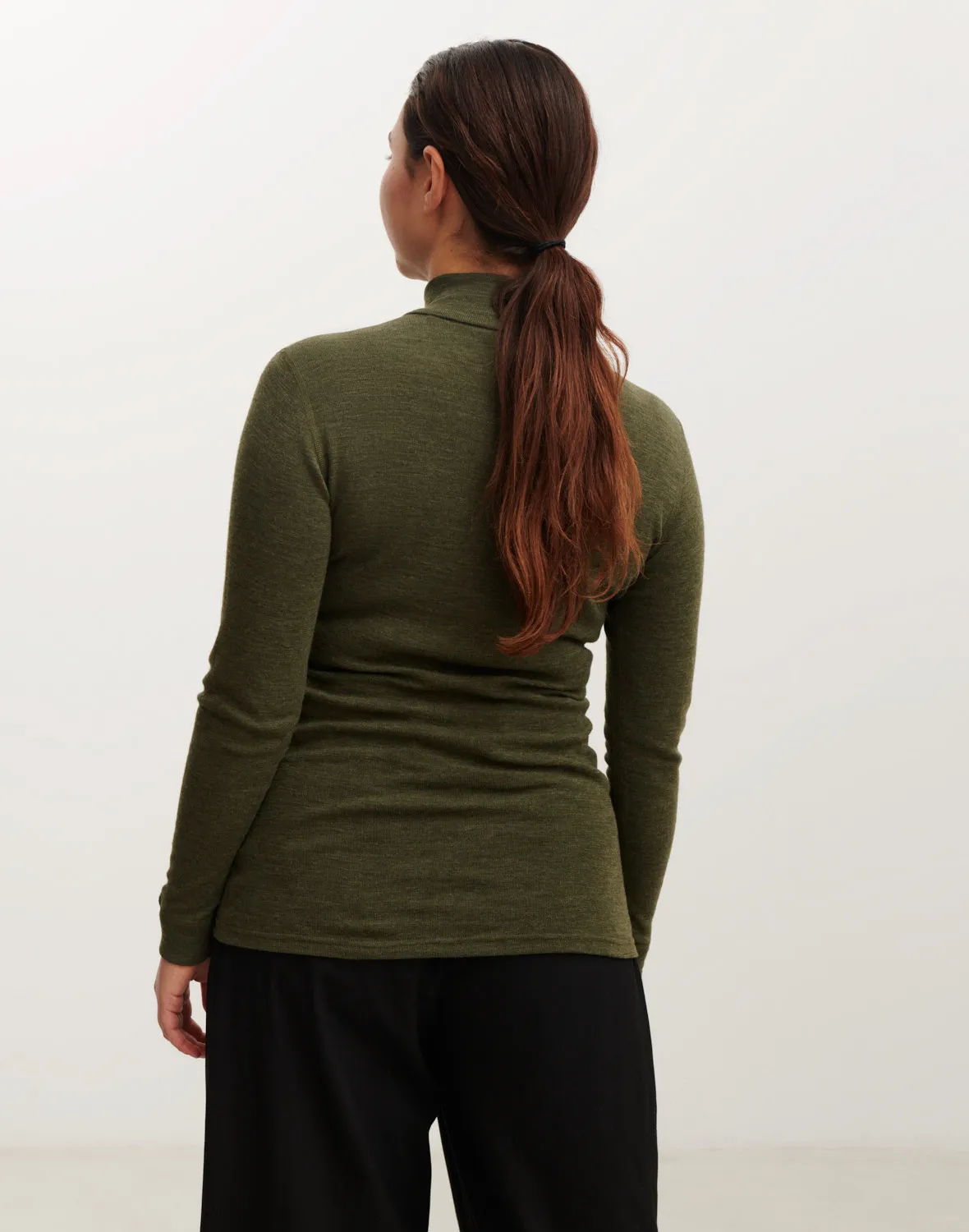 Haut à col zippé en laine de mérinos pour femme
